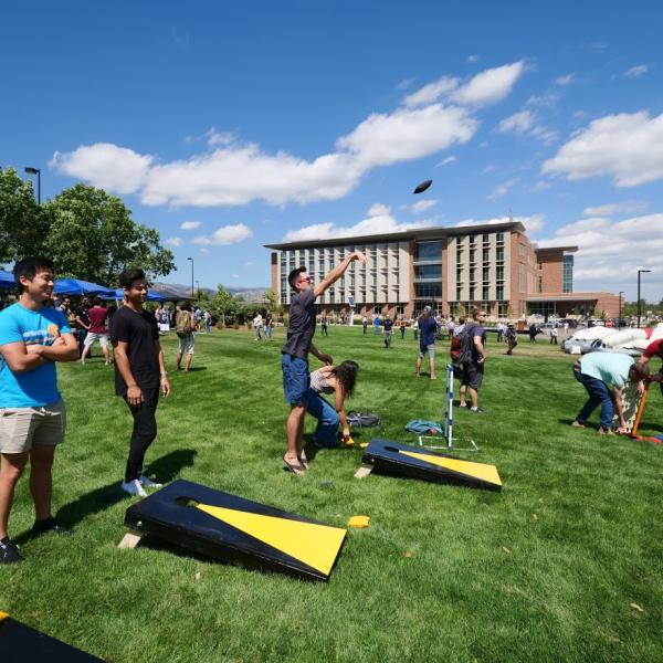 Attendees enjoy pre-ceremony activities at a ribbon-cutting ceremony at the new Aerospace Engineering Sciences Building at CU Boulder. (Photo by Glenn Asakawa/CU Boulder)