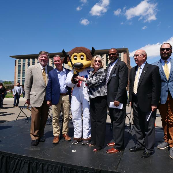 Dignitaries pose following a ribbon-cutting ceremony at the new Aerospace Engineering Sciences Building at CU Boulder. (Photo by Glenn Asakawa/CU Boulder)