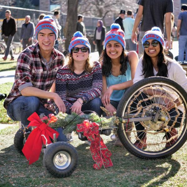 From left: Kevin Phan, Audrey Biland, Geya Kairamkonda and Hunsini Acharya with their holiday-themed drill powered car.