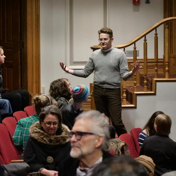 Pastor Zach Parris, Lutheran Campus Ministry, helps attendees engage in a dialogue at the MLK Day Celebration.
