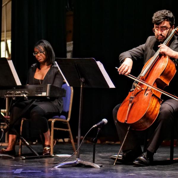 Sarah Gilliard, left, and Roberto Arundale perform "For All We Know" at the MLK Day Celebration.