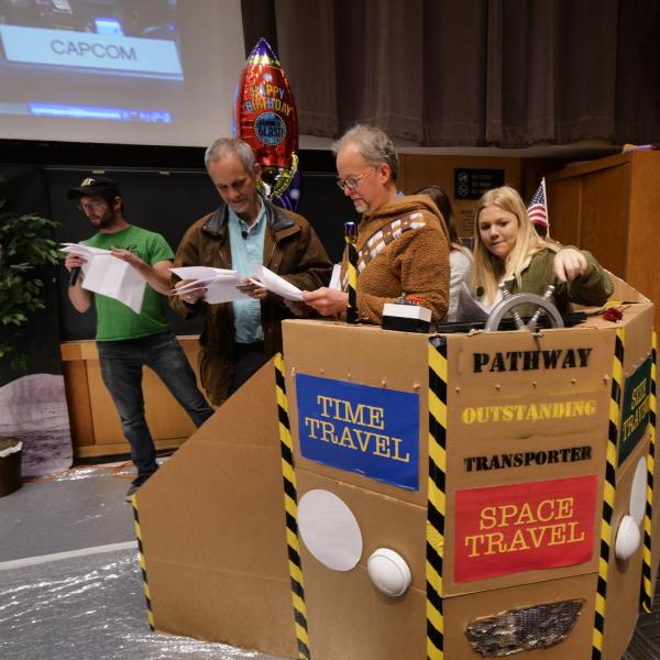 Students and instructors do a Material Application Performance to illustrate a moment in history on the kickoff to the Pathways to Space class. Photo by Glenn Asakawa.