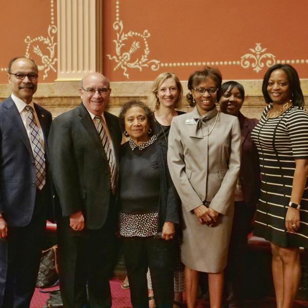 CU dignitaries pose with State Senator Rhonda Fields, third from right.