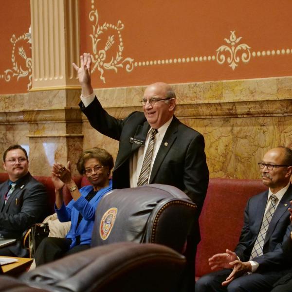 CU Boulder Chancellor Phil DiStefano is recognized by state Senator Rhonda Fields after she provided a tribute of Lucille Buchanan.