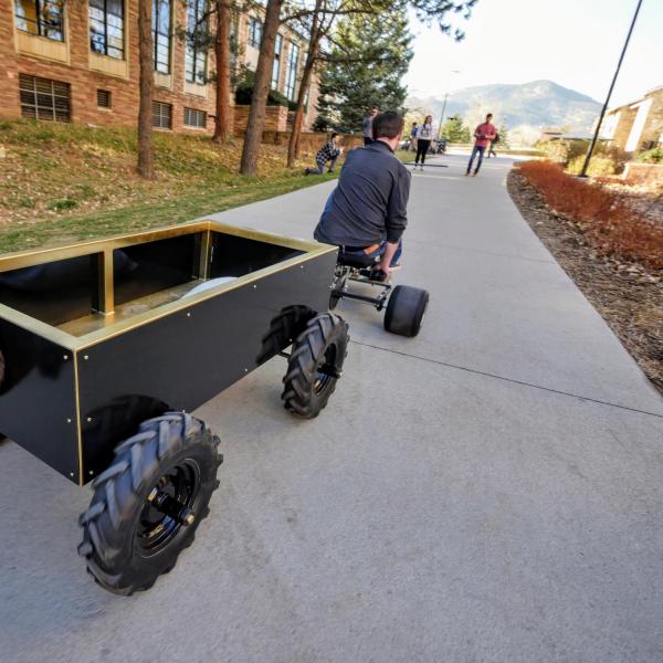 David Molitor of Broomfield hauls about 200 lbs in the tractor pull competition of the drill-powered vehicle contest. Unfortunately, his vehicle broke its chain before finishing and had to bow out.