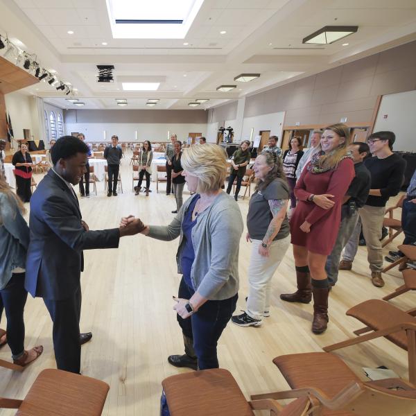 Attendees engage in an exercise as part of a breakout session