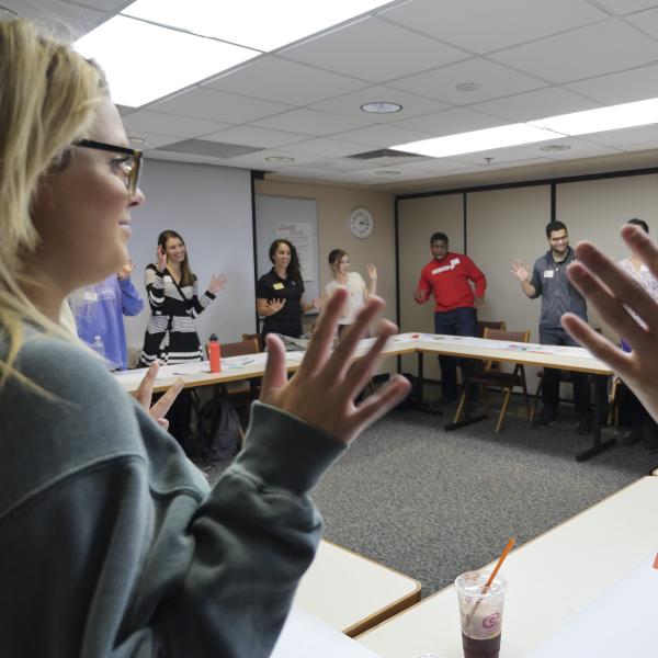 Attendees engage in an exercise as part of a breakout session
