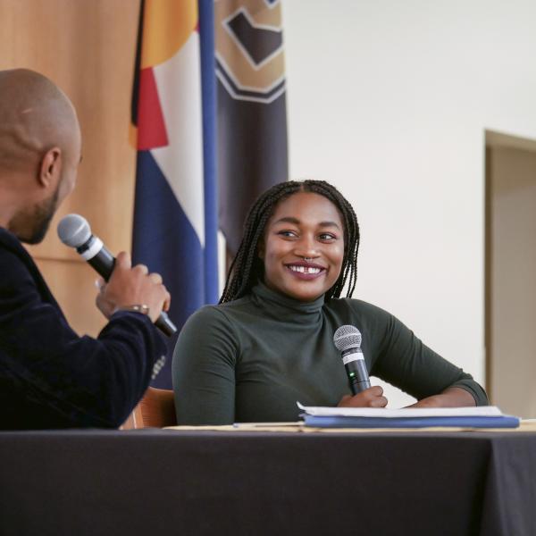The discussion brings a smile to the face of a panelist