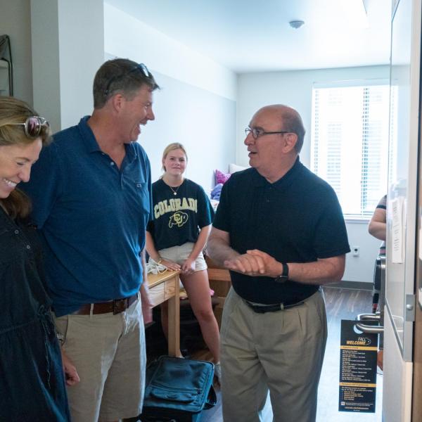 Chancellor Phil DiStefano meets with parents and students during move-in on Wednesday, Aug. 21, 2019, at Williams Village East. (Photo by Glenn Asakawa/University of Colorado)
