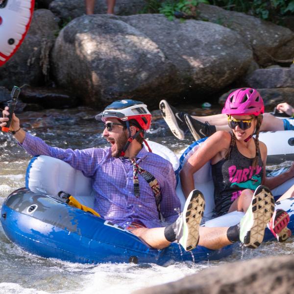 Brave tubers float down Boulder Creek for the 2019 Tube to Work Day.