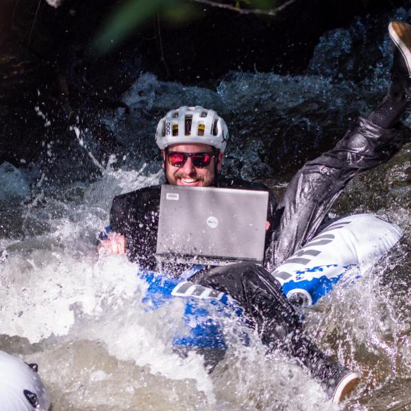 Brave tubers float down Boulder Creek for the 2019 Tube to Work Day.