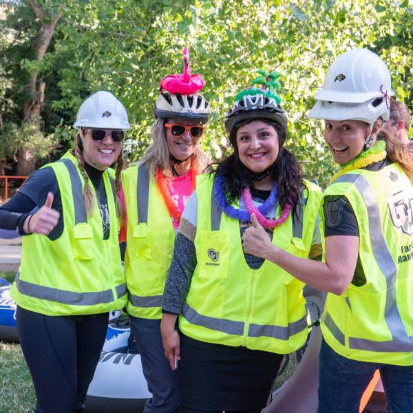 CU Facilities Management workers participate in the 2019 Tube to Work Day down Boulder Creek