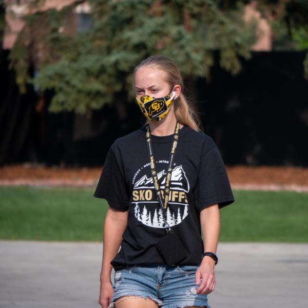 Students, staff and faculty, all wearing facial coverings and practicing proper social distancing protocols, participate in classes and study on the first day of the 2020 Fall semester on the CU Boulder Campus. (Photo by Glenn Asakawa/University of Colorado)
