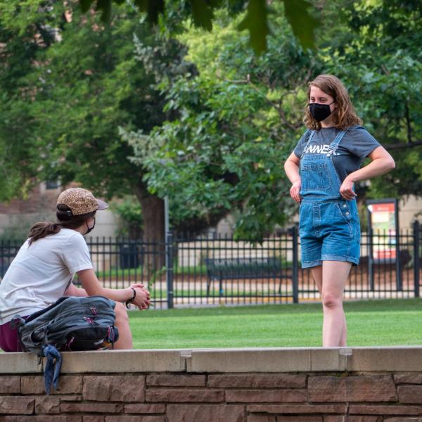 Students, staff and faculty, all wearing facial coverings and practicing proper social distancing protocols, participate in classes and study on the first day of the 2020 Fall semester on the CU Boulder Campus. (Photo by Glenn Asakawa/University of Colorado)