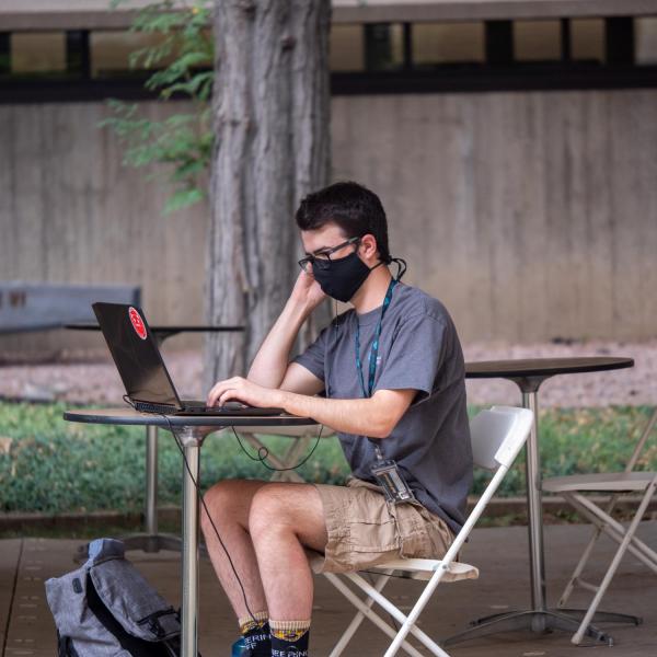 Students, wearing facial coverings and practicing proper social distancing protocols, participate in classes and study on the first day of the CU Boulder 2020 fall semester. (Photo by Glenn Asakawa/University of Colorado)
