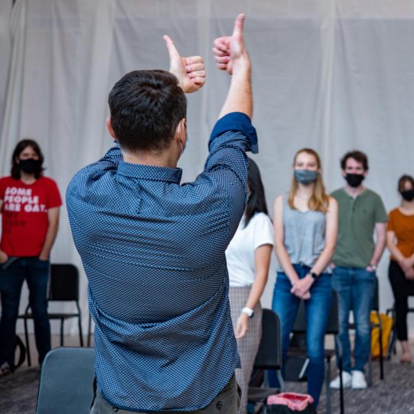 Undergraduate students participate in Associate Professor and CU Director of Bands Donald McKinney's conducting class in the new wing of the College of Music Imig building. (Photo by Glenn Asakawa/University of Colorado)