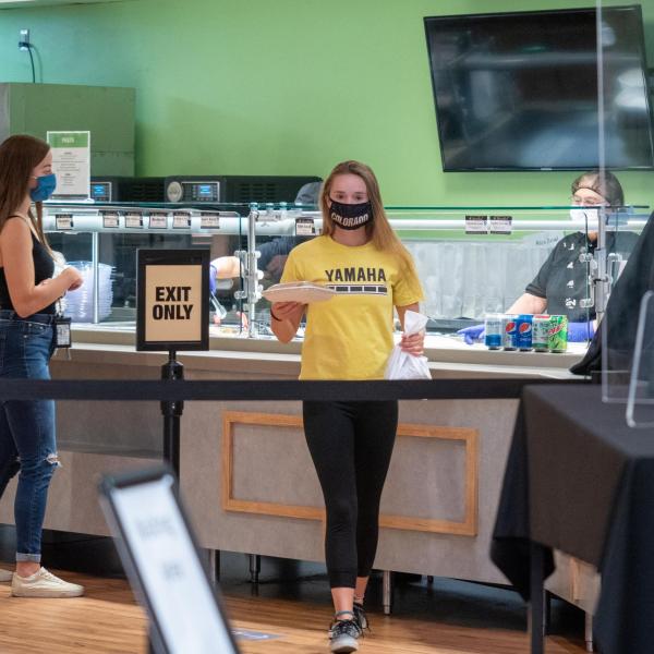 Students grab meals to go at the UMC on the first day of the 2020 Fall semester on the CU Boulder Campus. (Photo by Glenn Asakawa/University of Colorado)