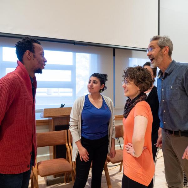 Members of the CU Playback Theatre Ensemble chat before the start of a session titled “Playing with Intention: Workshop & Performance” at the CU Boulder 2020 Spring Diversity Summit. (Photo by Glenn Asakawa/University of Colorado)