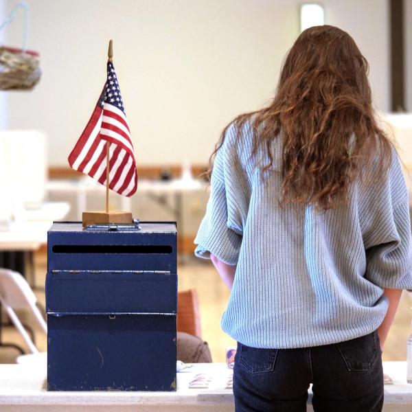Students arrive at the polling center in the Glenn Miller Ballroom at the University Memorial Center. (Photo by Glenn Asakawa/University of Colorado)