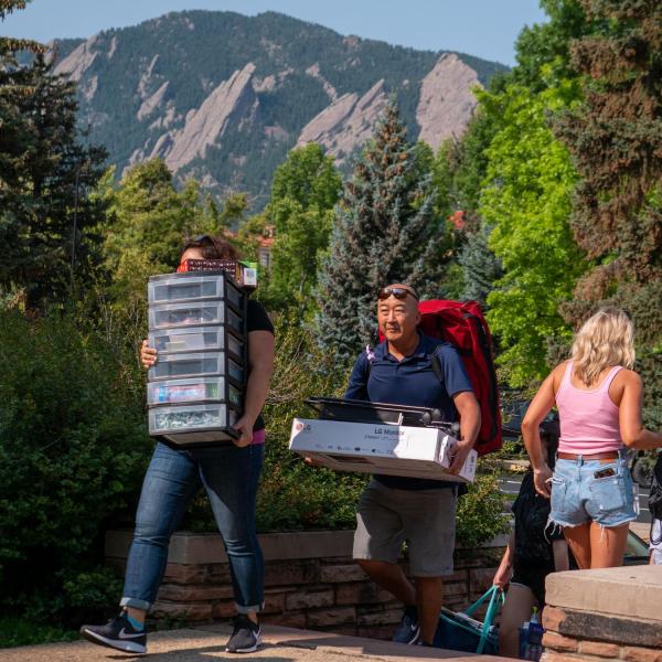 First-year students, parents, staff and volunteers welcome each other back to CU Boulder on Monday, Aug. 16, 2021. (Photo by Patrick Campbell/University of Colorado)