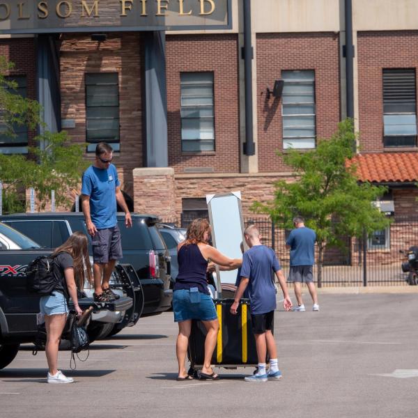 First-year students, parents, staff and volunteers welcome each other back to CU Boulder on Monday, Aug. 16, 2021. (Photo by Patrick Campbell/University of Colorado)