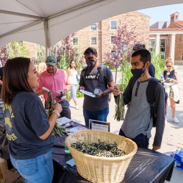 First-year students, parents, staff and volunteers welcome each other back to CU Boulder on Monday, Aug. 16, 2021. (Photo by Patrick Campbell/University of Colorado)