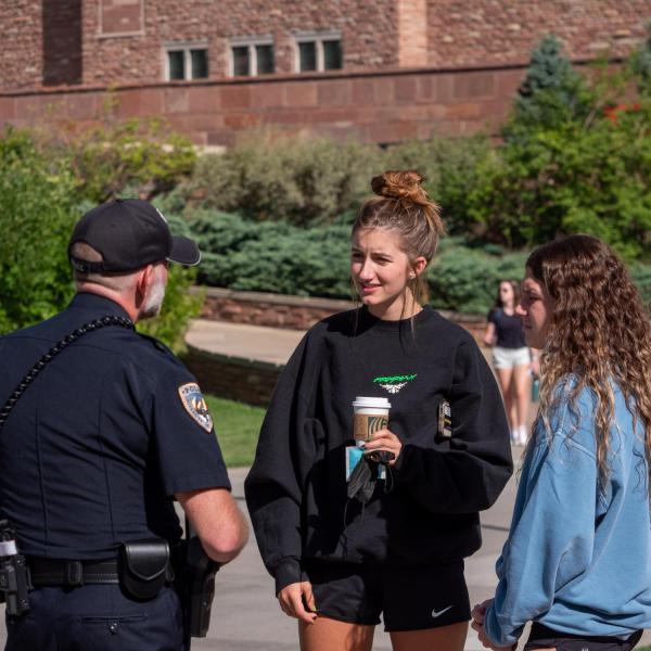 Students meet with CUPD officers during the semester's first Coffee with a Cop event. (Photo by Patrick Campbell/University of Colorado)