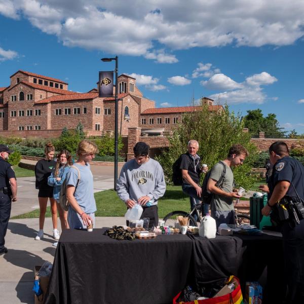Students meet with CUPD officers during the semester's first Coffee with a Cop event. (Photo by Patrick Campbell/University of Colorado)