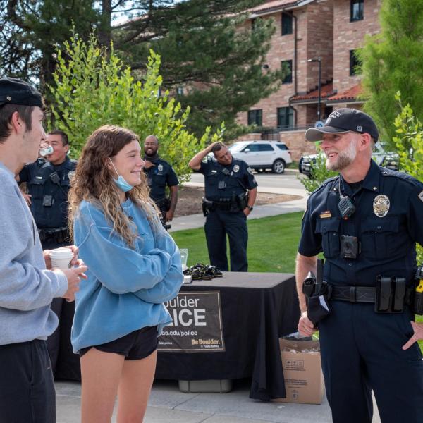 Students meet with CUPD officers during the semester's first Coffee with a Cop event. (Photo by Patrick Campbell/University of Colorado)