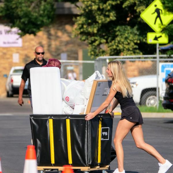 First-year students, parents, staff and volunteers welcome each other back on the CU Boulder campus in the Williams Village Complex on Monday, Aug.16, 2021. (Photo by Glenn Asakawa/University of Colorado)