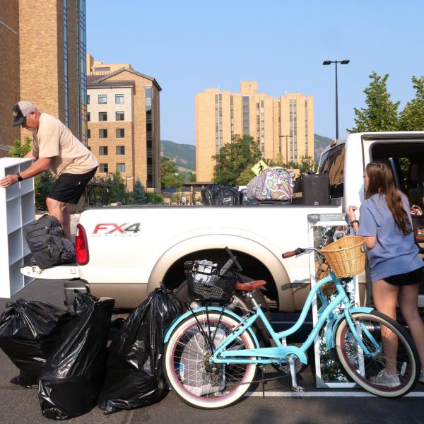 First-year students, parents, staff and volunteers welcome each other back on the CU Boulder campus in the Williams Village Complex on Monday, Aug.16, 2021. (Photo by Glenn Asakawa/University of Colorado)