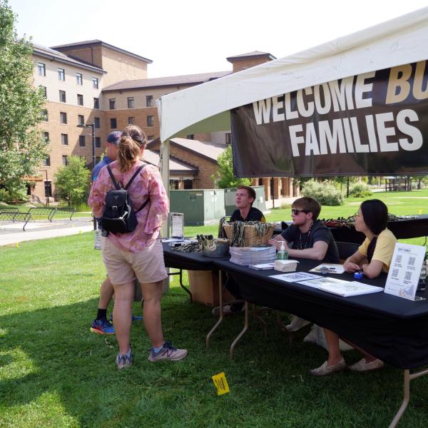 First-year students, parents, staff and volunteers welcome each other back on the CU Boulder campus in the Williams Village Complex on Monday, Aug.16, 2021. (Photo by Glenn Asakawa/University of Colorado)