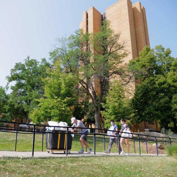First-year students, parents, staff and volunteers welcome each other back on the CU Boulder campus in the Williams Village Complex on Monday, Aug.16, 2021. (Photo by Glenn Asakawa/University of Colorado)