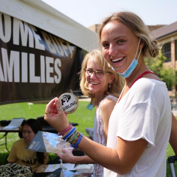 First-year students, parents, staff and volunteers welcome each other back on the CU Boulder campus in the Williams Village Complex on Monday, Aug.16, 2021. (Photo by Glenn Asakawa/University of Colorado)