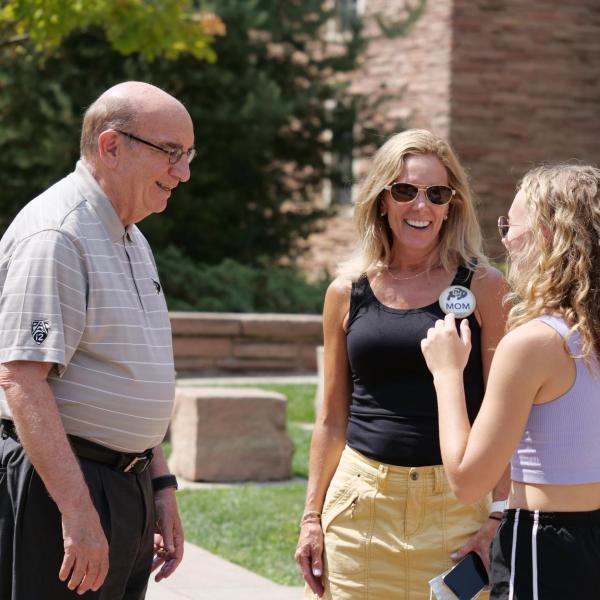 Chancellor Phil DiStefano greets parents, students and staff during a tour of Hallett Hall on the first day of Move-In on Monday, Aug. 16, 2021. (Photo by Glenn Asakawa/University of Colorado)