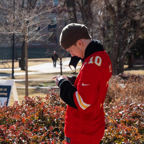 CU Boulder first year student Robert Akin-Amland provides his first COVID-19 test after moving back into his residence hall in the Kittredge complex on Feb. 7, 2021. (Photo by Glenn Asakawa/University of Colorado)