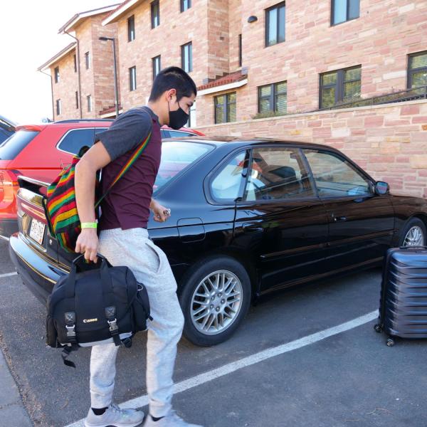 Fernando Gonzalez, a first year CU Boulder aerospace engineering student, returns to the Kittredge Central residence hall on Feb. 7, 2021. (Photo by Glenn Asakawa/University of Colorado)
