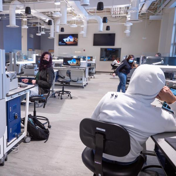 Students stay socially distanced and wear masks in a class at the Aerospace Building during the first week of in-person instruction in the 2021 Spring semester. (Photo by Glenn Asakawa/University of Colorado)