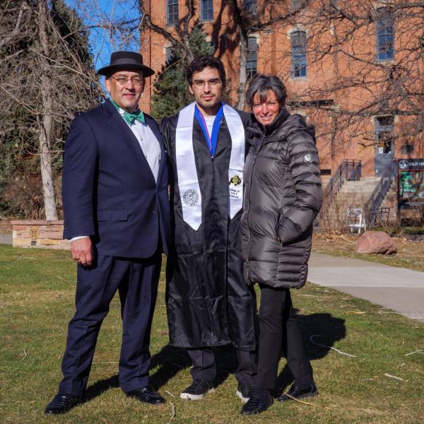 Graduates and families celebrating 2021 winter conferral. Photo by Patrick Campbell.