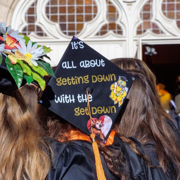 Graduates and families celebrating 2021 winter conferral. Photo by Patrick Campbell.
