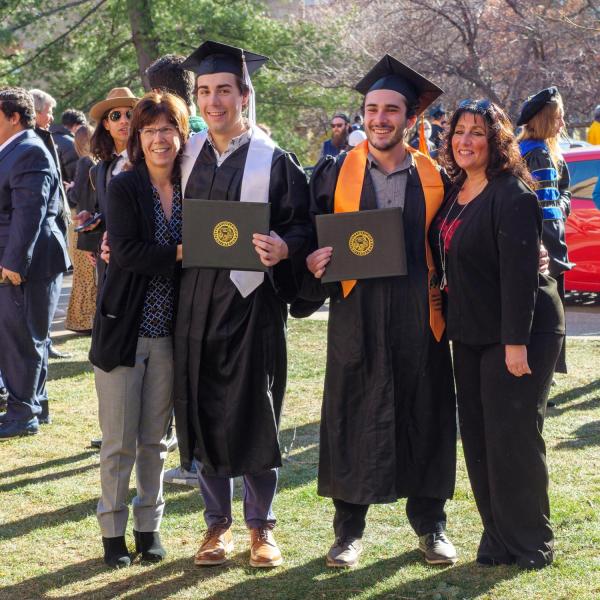 Graduates and families celebrating 2021 winter conferral. Photo by Patrick Campbell.