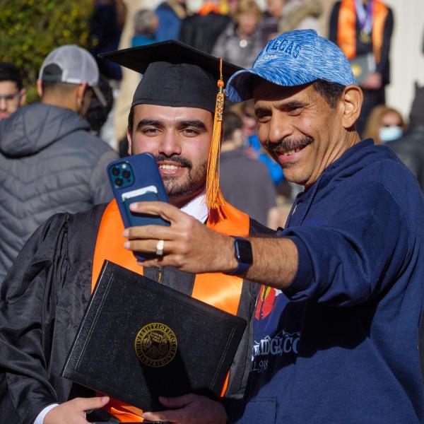 Graduates and families celebrating 2021 winter conferral. Photo by Patrick Campbell.