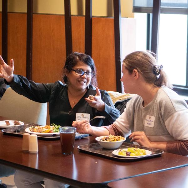 CU President Todd Saliman meets with students over lunch at the C4C.