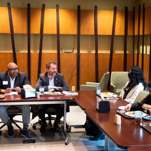 CU President Todd Saliman meets with students and Dean of Students JB Banks over lunch at the C4C.
