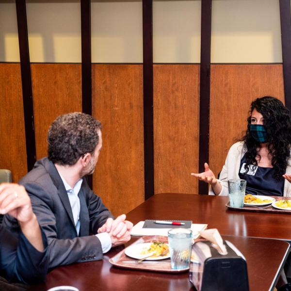 CU President Todd Saliman meets with students over lunch at the C4C.