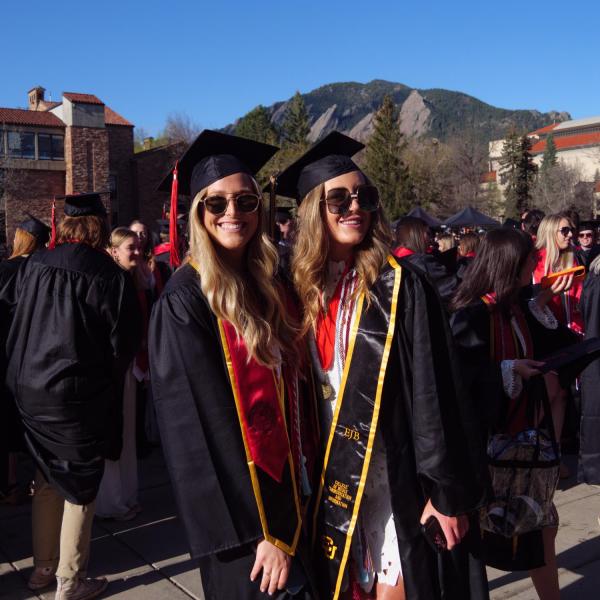 Students and faculty gather on the quad before processing to Folsom Stadium