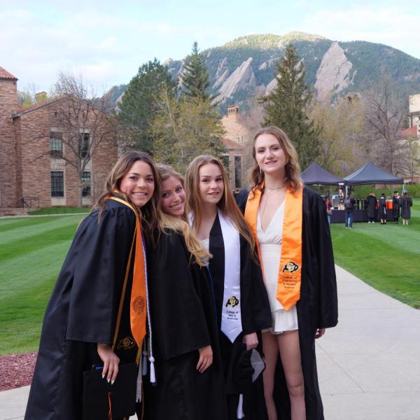 Students and faculty gather on the quad before processing to Folsom Stadium