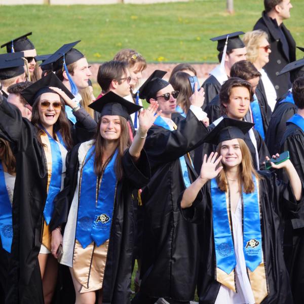 Commencement procession from Norlin Quad to Folsom Stadium