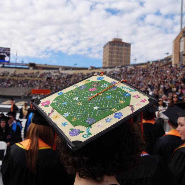 Commencement procession from Norlin Quad to Folsom Stadium