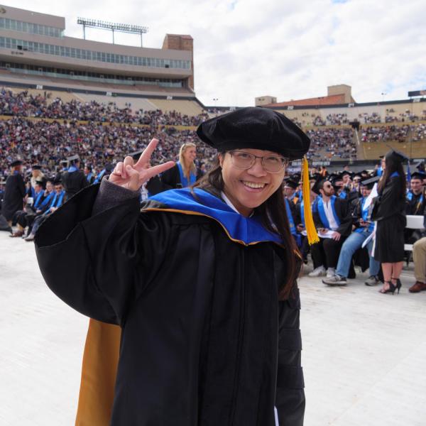 Commencement procession from Norlin Quad to Folsom Stadium
